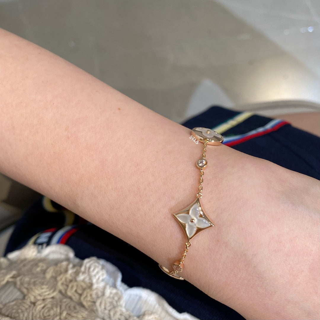 [Vellora Opalyn]STAR AND SUN 4 MOTIF WHITE MOP PINK GOLD BRACELET